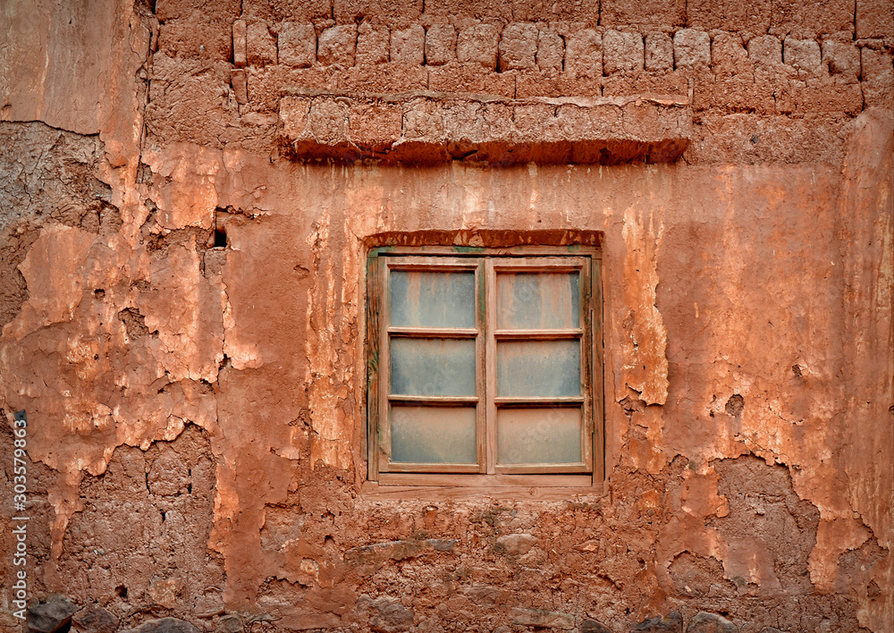 Window in an abandoned house in Nuodeng village, China