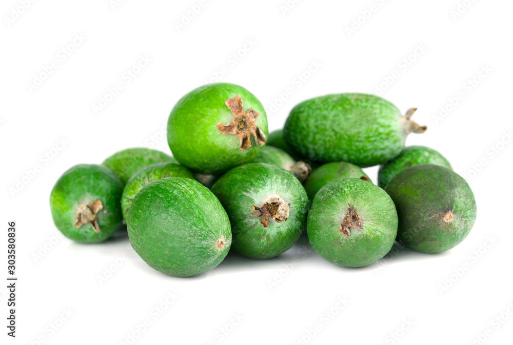 Juicy and ripe feijoa isolated on a white background. Healthy autumn fruit. Juicy and ripe feijoa isolated on a white background. Healthy autumn fruit.
