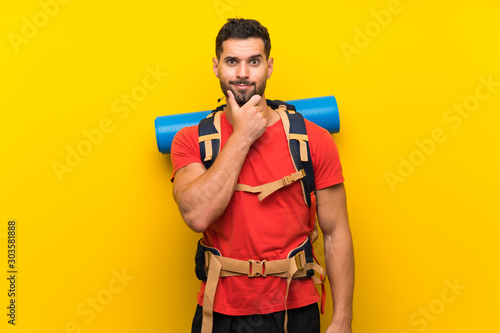 Young hiker man laughing