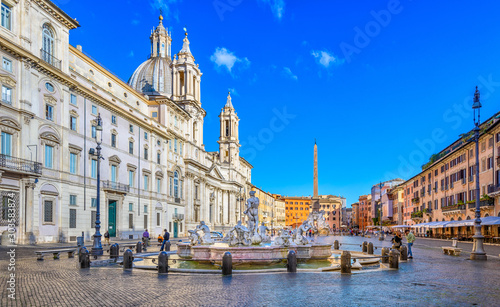 Church Sant Agnese in Agone, Palazzo Pamphilj and Fontana del Moro (Moor Fountain) on Piazza Navona in Rome, Italy. Architecture and landmark of Rome. Postcard of Rome.