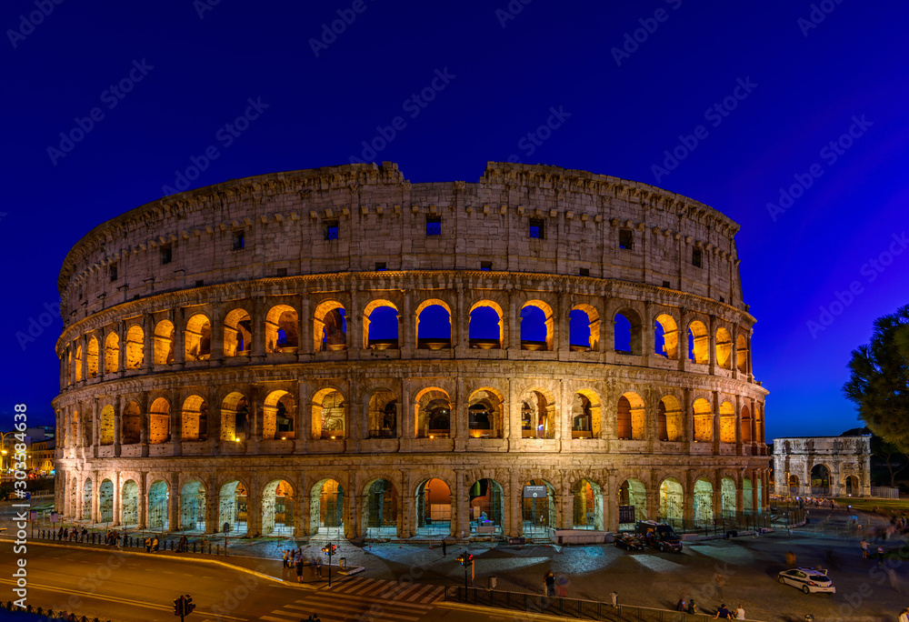 Night view of Colosseum in Rome, Italy. Architecture and landmark of Rome. Postcard of Rome.