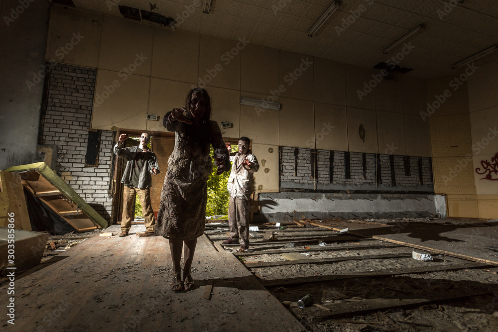 Zombies attack in an abandoned dark building Zombies attack in an abandoned dark building