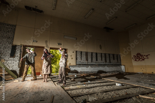 Wallpaper Mural Zombies attack in an abandoned dark building Torontodigital.ca