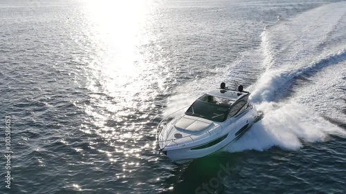 luxury motor boat in navigation aerial view photo