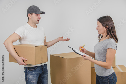 Photography Delivery guy transported all the cardboard boxes into new flat