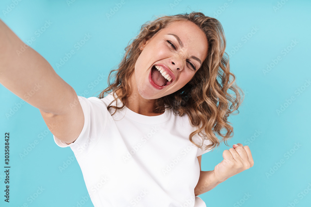 Attractive lovely young girl wearing casual clothing standing Attractive lovely young girl wearing casual clothing standing