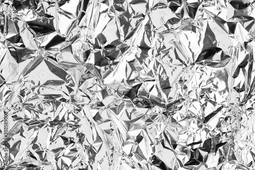 Foil silver crumpled metal aluminum texture background surface decoration backdrop design photo hi resolution photo