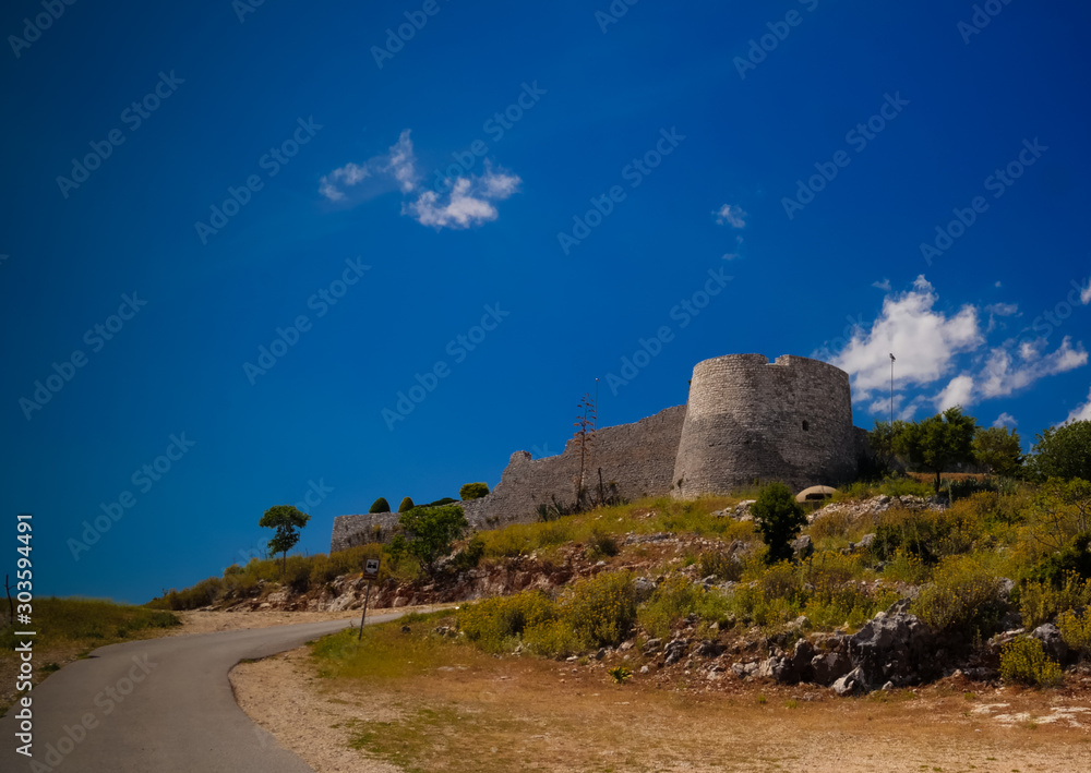 Landscape with the Lekuresi Castle and military bunkers, Saranda, Albania