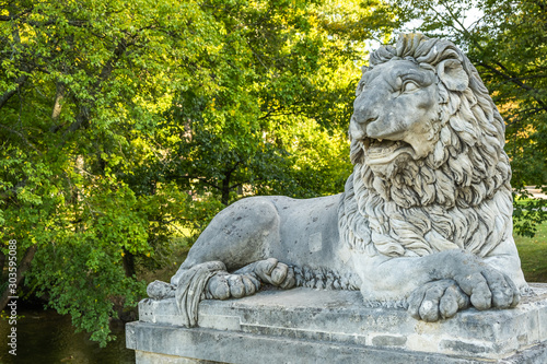 View of lion statute at Laxenburg castles park in the evening, the castles became a Habsburg possession in 1333 and formerly served as a summer retreat, at Laxenburg, Lower Austria, Austria.