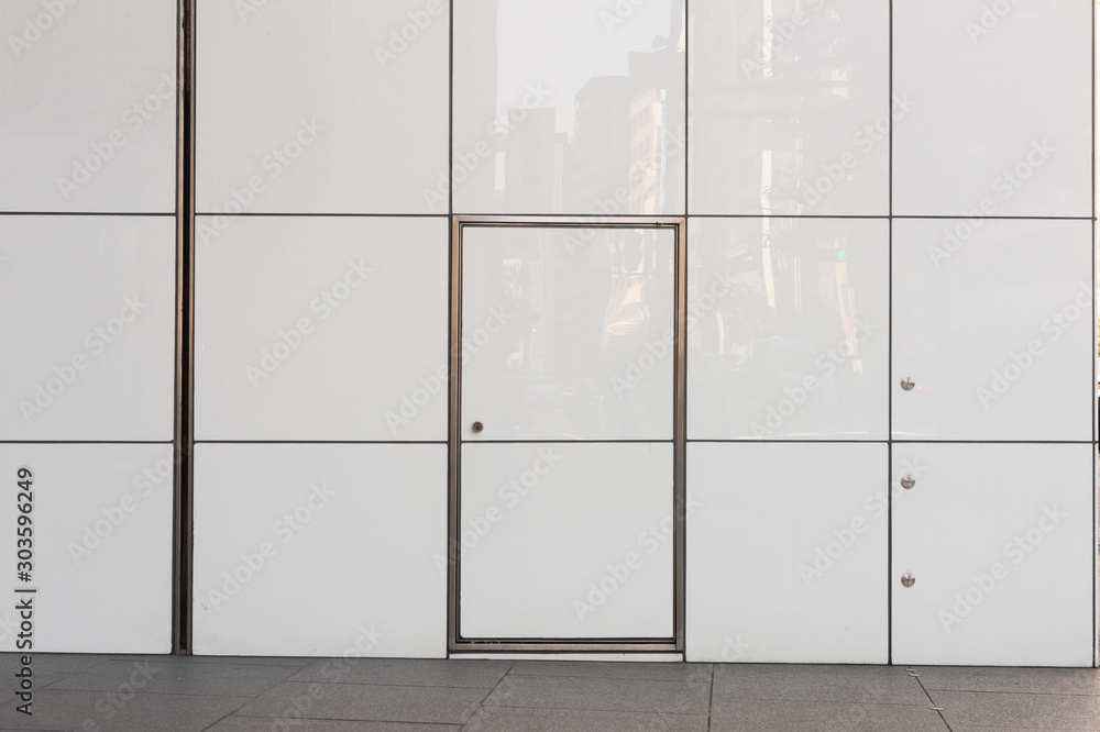 Fotografie sidewalk by street wall & door