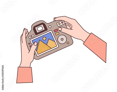 Hands holding digital camera flat vector illustration