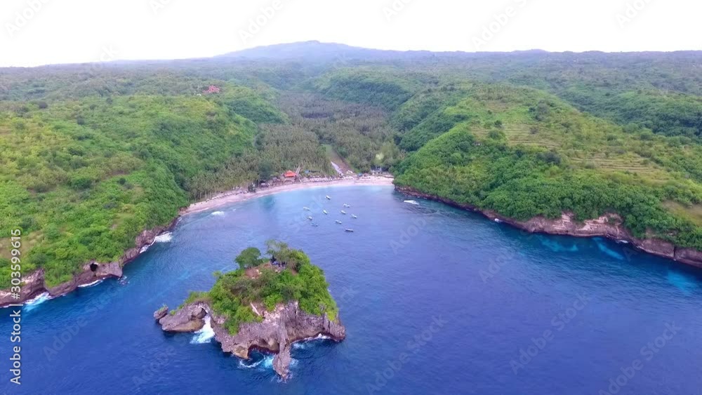 Beautiful viewpoint of Kelingking beach in Nusa Penida island, Bali, Indonesia. Drone view. Beautiful viewpoint of Kelingking beach in Nusa Penida island, Bali, Indonesia. Drone view.