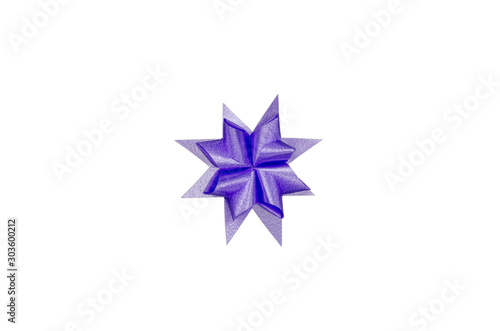 Purple gift bow isolated on the white background with clipping path