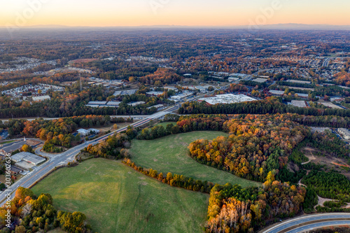 Aerial view available empty lot in suburban community in southern united states during the fall