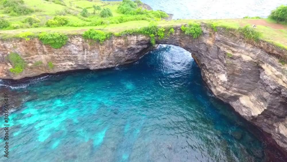 Beautiful viewpoint of Kelingking beach in Nusa Penida island, Bali, Indonesia. Drone view. Beautiful viewpoint of Kelingking beach in Nusa Penida island, Bali, Indonesia. Drone view.