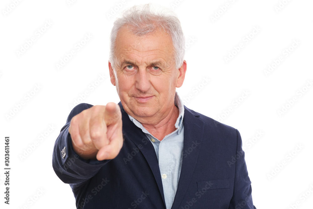 Senior man points something with his finger Senior man points something with his finger