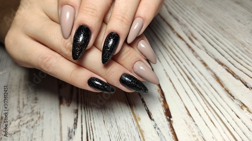 Fotografie stylish design of manicure on beautiful nails