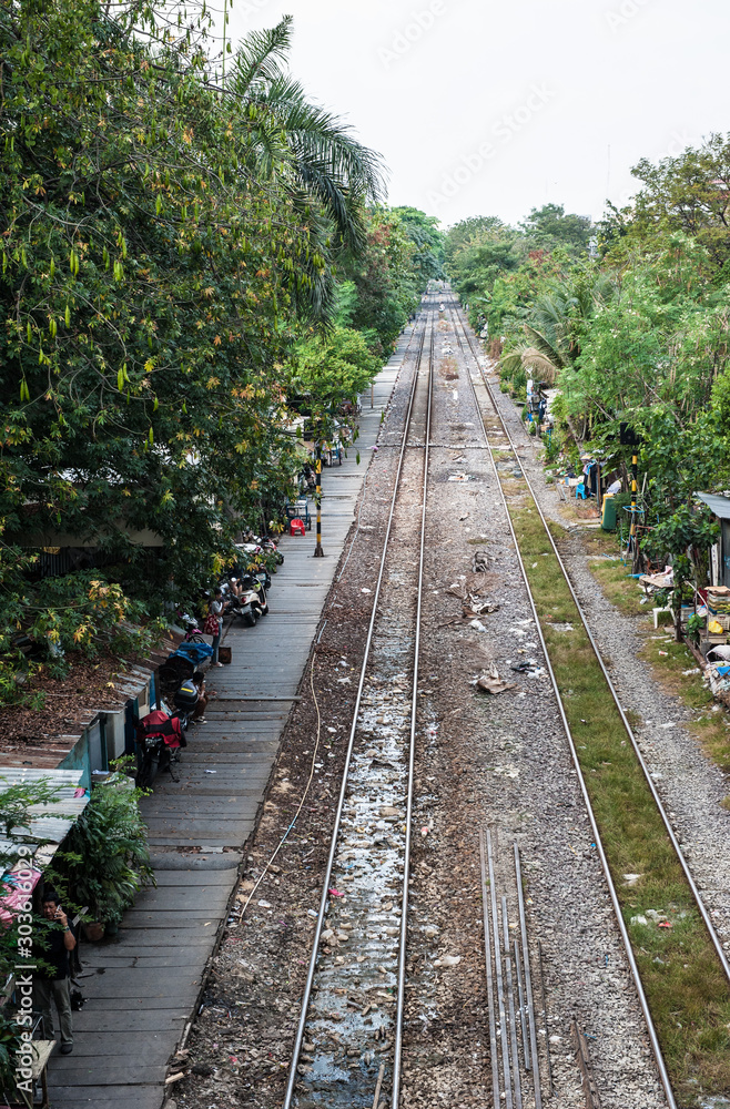 People living near tails on the street in city of Bangkok.  Real life near railways. Poor people life.