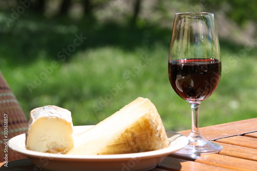 Red wine in the glass and cheese