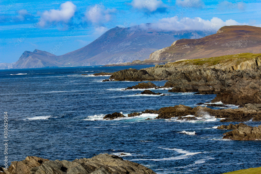 Achill Island, Ireland - crystal blue water on a sunny day with blue skies