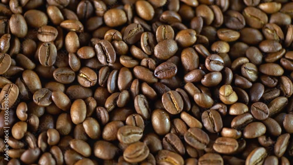 Coffee beans. Whole beans coffee, close up, directly from above. Food background Coffee beans. Whole beans coffee, close up, directly from above. Food background