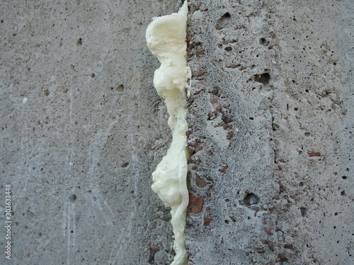 polyurethane foam filled crack in the wall