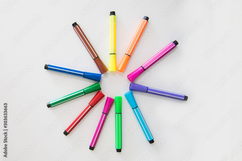 Colored felt pens, white background