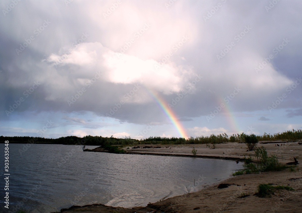 Siberia-rainbow over the lake.