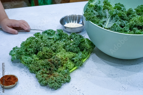 Top view - sea kale salad sprinkled with sesame seeds. Restaurant menu