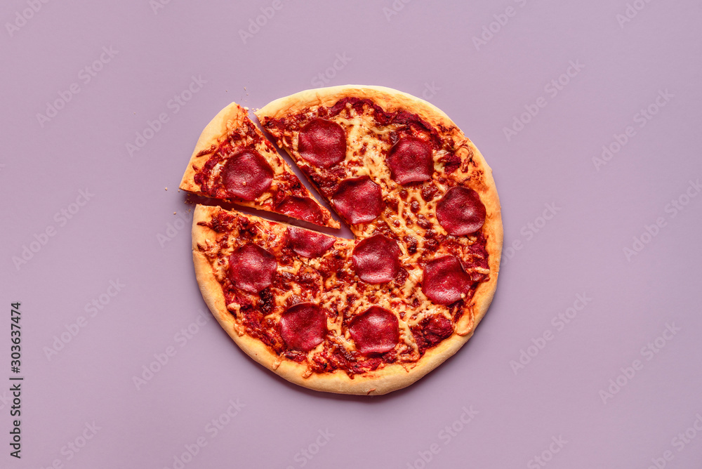 Pepperoni pizza and one slice. Pizza salami and one piece sliced Pepperoni pizza and one slice. Pizza salami and one piece sliced