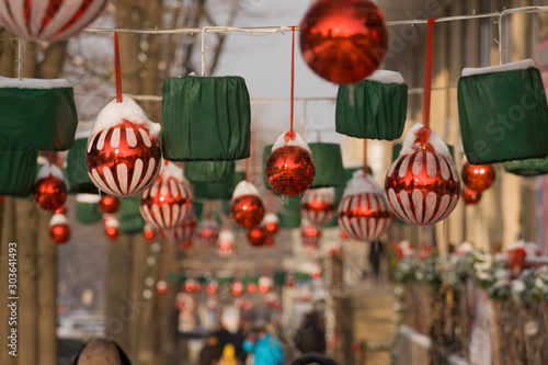 The decoration of the streets and storefronts of new year and Christmas toys balls, lanterns.