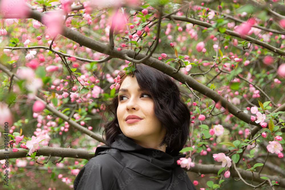 portrait of young woman in spring garden portrait of young woman in spring garden