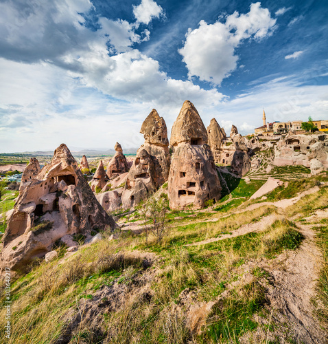 Unreal world of Cappadocia. Splendid summer view of Uchisar Castle. Sunny morning scene of famous Uchisar village, district of Nevsehir Province in the Central Anatolia Region of Turkey, Asia.