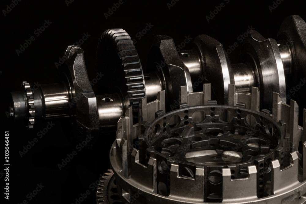 high performance racing motorcycle parts, clutch crankshaft on black mirror high performance racing motorcycle parts, clutch crankshaft on black mirror