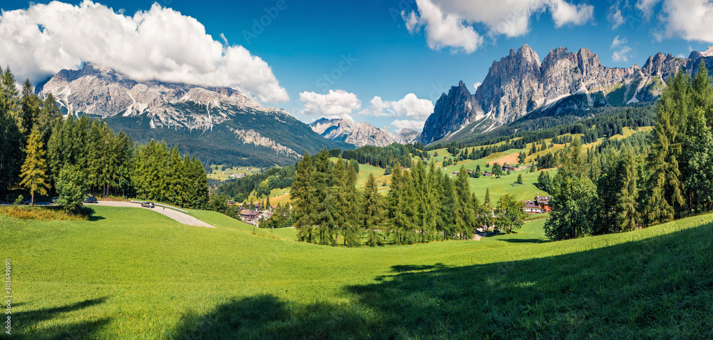 Panoramic morning view of Cortina d’Ampezzo resort. Spectacular summer scene of Dolomiti Alps, Province of Belluno, Italy, Europe. Beauty of countryside concept background.