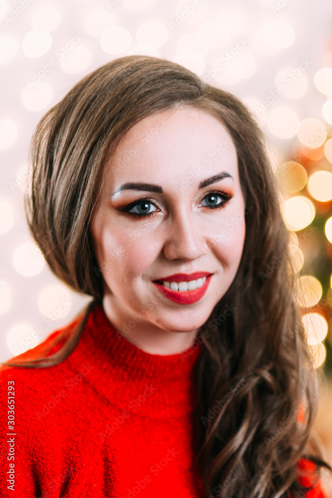 Portrait of a girl. Girl smiling. Girl celebrates Christmas Portrait of a girl. Girl smiling. Girl celebrates Christmas
