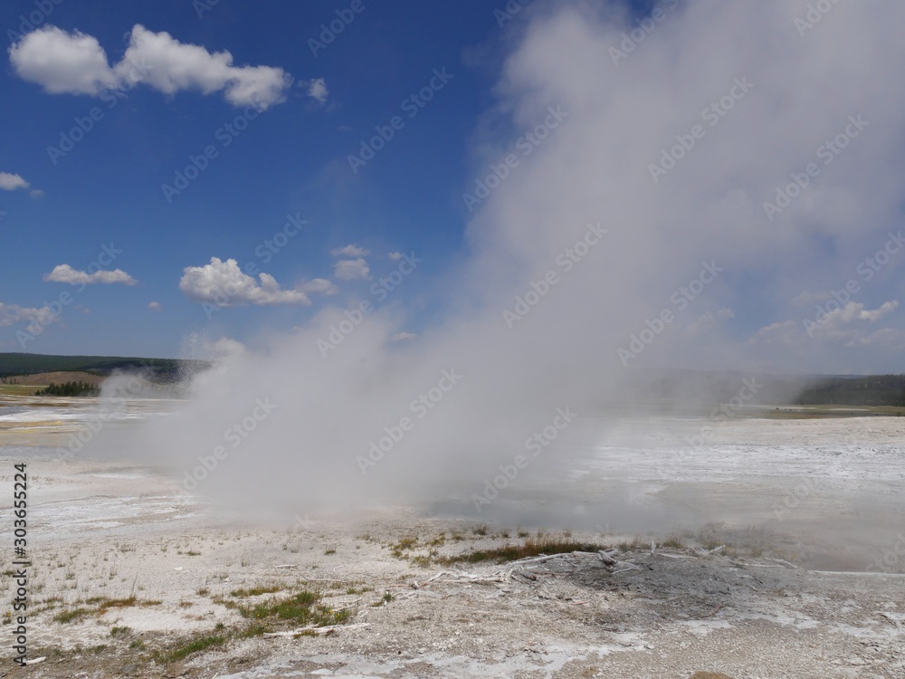 Close up of steam rising from the Clepsydra Geyser at the Lower Geyser Basin, Yellowstone National Park.