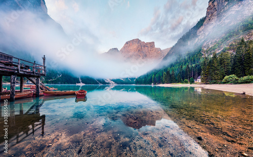 Gorgeous morning view of Braies (Pragser Wildsee) lake. Incredible summer scene of Fanes-Sennes-Braies national park, Dolomiti Alps, South Tyrol, Italy, Europe. Beauty of nature concept background.