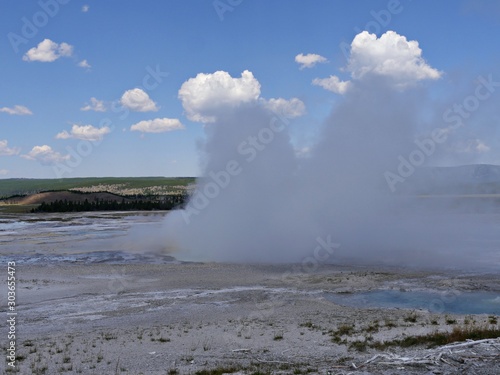 Cropped shot of steam rising from the Clepsydra Geyser at the Lower Geyser Basin, Yellowstone National Park.