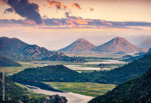 Aerial view of Canyon of Rijeka Crnojevica river, Skadar lake location. Dramatic summer sunrise of Montenegro countryside. Beautiful world of Mediterranean countries.