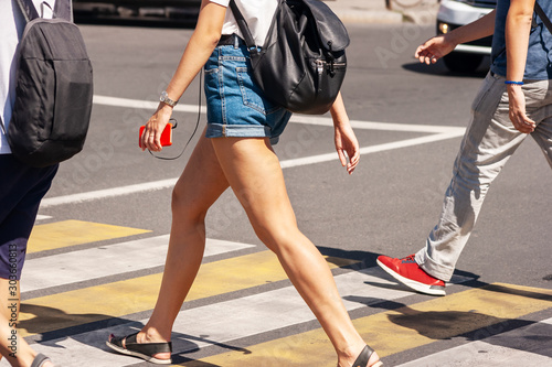 pedestrians crossing the street