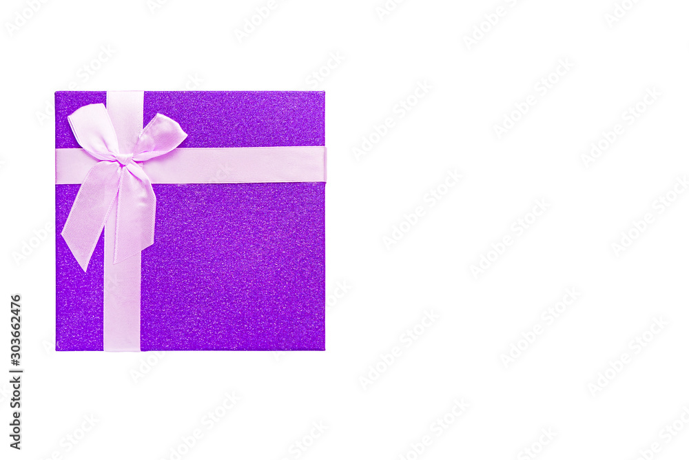 Purple gift box with pink ribbon isolated on white background. Purple gift box with pink ribbon isolated on white background.