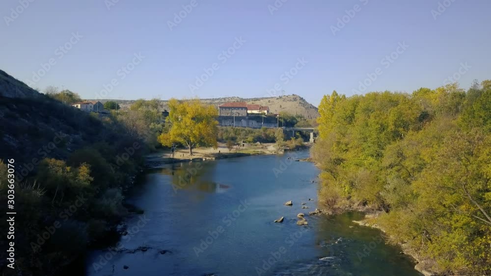 River Zeta Montenegro. Large River Flows Through Forest Landscape in Montenegro. Clear Blue Water. Beautiful Autumn Nature. Vranjske Njive Rijeka Zeta. River Zeta Montenegro. Large River Flows Through Forest Landscape in Montenegro. Clear Blue Water. Beautiful Autumn Nature. Vranjske Njive Rijeka Zeta.