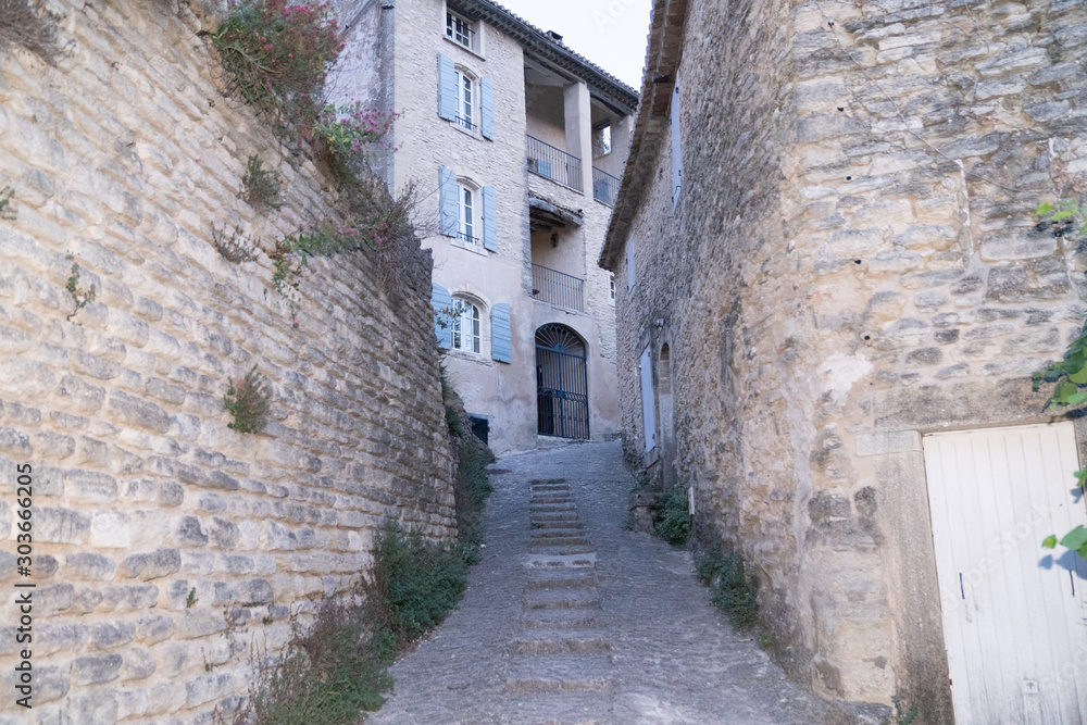 gordes stones stairs in alley village in Luberon France South