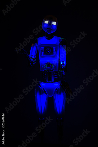 Robot man in the dark. Future concept