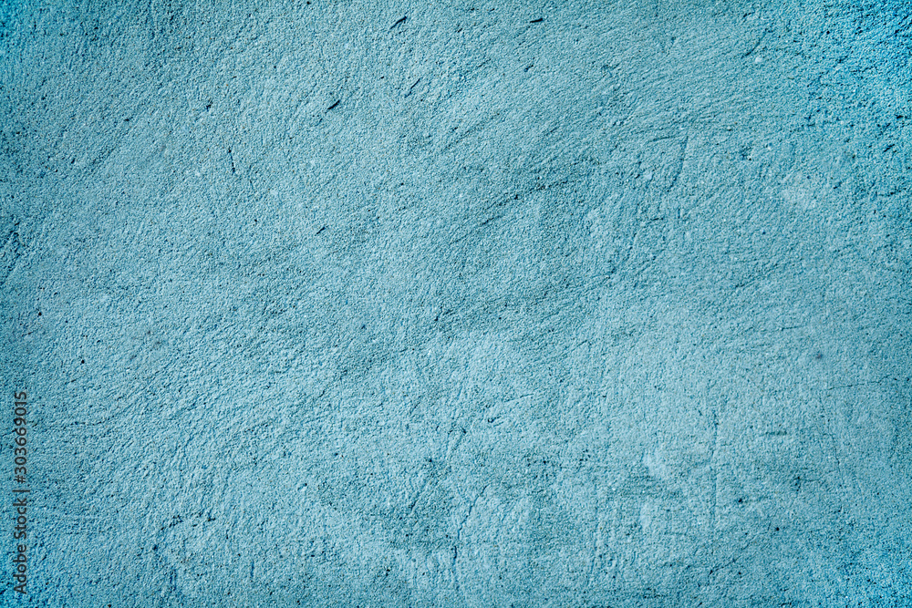 Background - grain texture blue paint wall. Beautiful abstract grunge decorative navy blue dark wallpaper. Cement wall texture in blue color.