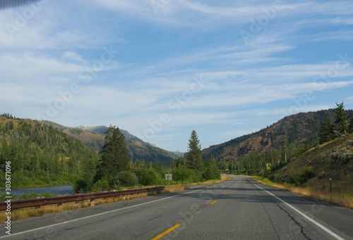 Beautiful drive along North Fork Highway with the North Fork Soshone River flowing, on the road to the east entrance of Yellowstone National Park.