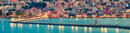 Panoramic morning cityscape of Argostolion town, former municipality on the island of Kefalonia, Ionian Islands, Greece. Impressive summer seascape of Ionian Sea. Traveling concept background.