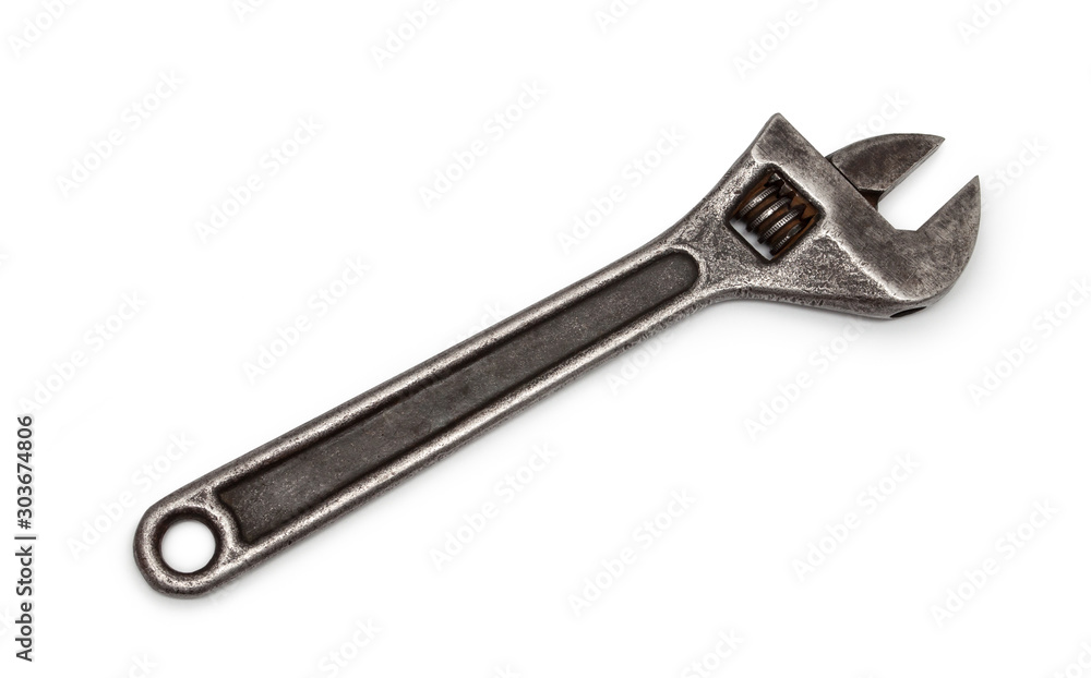 Swedish adjustable wrench. half closed, half open. old wrench on isolated white background. plumbing repair, concept. Swedish adjustable wrench. half closed, half open. old wrench on isolated white background. plumbing repair, concept.