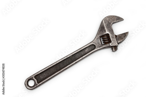 Swedish adjustable wrench. old wrench on isolated white background. plumbing repair.